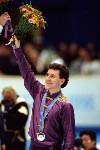 Canada's Elvis Stojko recieves the silver medal from IOC's Canadian member Dick Pound at the figure skating event at the 1998 Nagano Winter Olympic Games. (CP Photo/ COA)