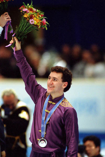 Canada's Elvis Stojko celebrates after winning the silver medal in the figure skating event at the 1998 Nagano Winter Olympic Games. (CP Photo/ COA)