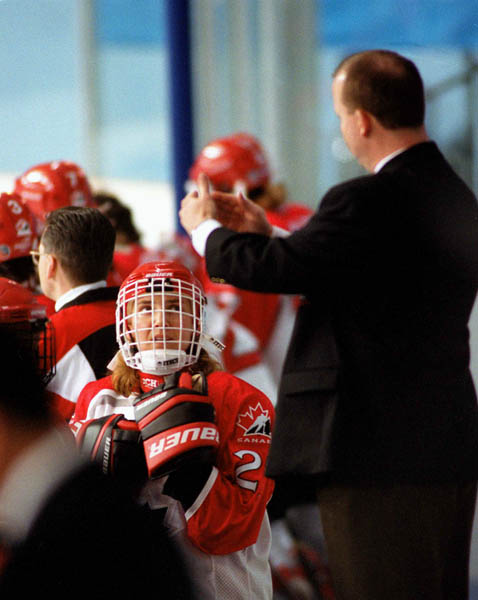 Canada's women's hockey coach Ray Bebbett gives instructions at the 1998 Nagano Winter Olympics. (CP PHOTO/COA/Mike Ridewood)