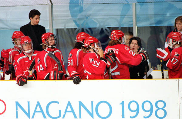 Canada's women's hockey team compete at the 1998 Nagano Winter Olympics. (CP PHOTO/COA/Mike Ridewood)