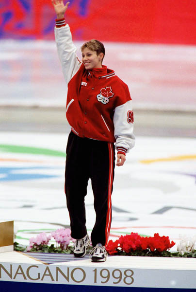 Canada's Catriona Le May Doan celebrates after winning a bronze medal in a long track speed skating event at the 1998 Nagano Winter Olympics. (CP PHOTO/COA/Mike Ridewood)