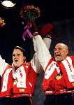 Canada's Pierre Lueders (left) and Dave MacEachern celebrate their gold medal win in the two-man bobsleigh event at the 1998 Nagano Winter Olympics. (CP PHOTO/COA/F. Scott Grant)