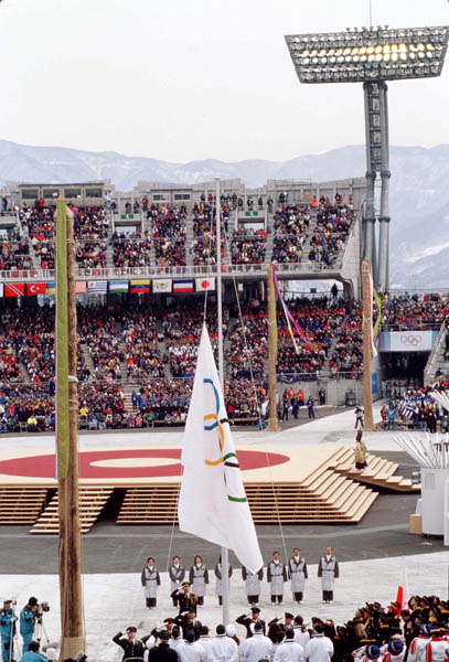 The Olympic flag is raised during the opening ceremony of the 1998 winter Olympic Games in Nagano. (CP Photo/ COA/F. Scott Grant)