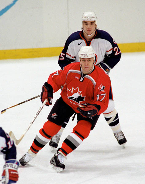 Canada's Rod Brind'Amour (17) competes in hockey action against the United States at the 1998 Winter Olympics in Nagano. (CP Photo/COA/ F. Scott Grant )