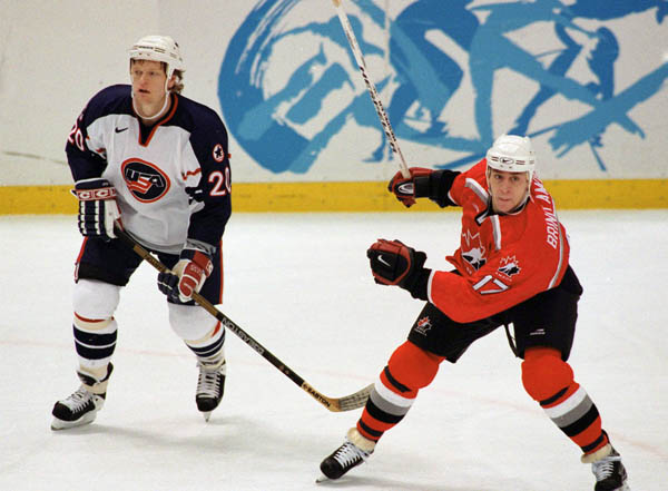 Canada's Rod Brind'Amour (right) Competes in hockey action against the United States at the 1998 Winter Olympics in Nagano. (CP Photo/COA/ F. Scott Grant )