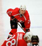 Canada's Shayne Corson competes in hockey action at the 1998 Winter Olympics in Nagano. (CP Photo/COA/ F. Scott Grant )