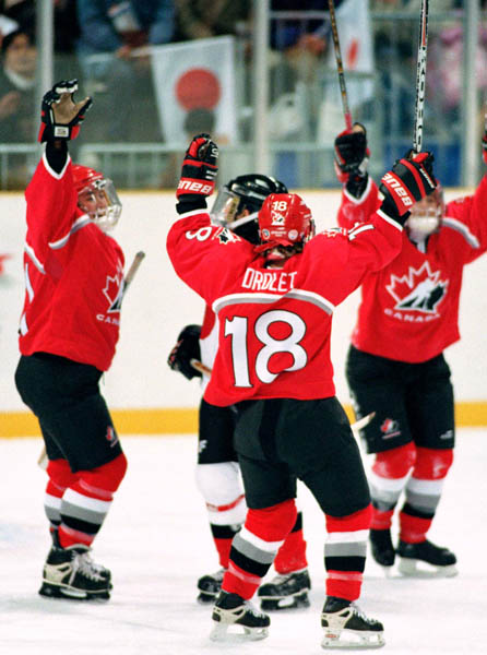 Canada's Nancy Drolet and her teammates compete in women hockey action at the 1998 Nagano Winter Olympics. (CP PHOTO/COA/Mike Ridewood)