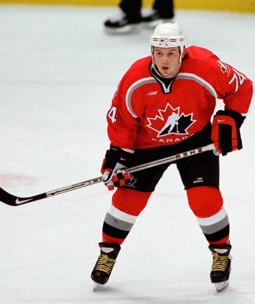 Canada's Theoren Fleury competes in hockey action at the 1998 Winter Olympics in Nagano. (CP Photo/COA/ F. Scott Grant )