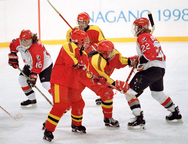 Canada's Jayna Hefford (16) and Hayley Wickenheiser (22) compete in the women hockey action against China at the 1998 Nagano Winter Olympics. (CP PHOTO/COA/Mike Ridewood)