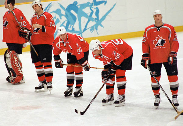 (From left to right) Canada's Martin Brodeur (30), Brendan Shanahan (14) Wayne Gretzky (99), Eric Lindros (88) and Joe Nieuwendyk (25) stand at the blue line during hockey action at the 1998 Winter Olympics in Nagano. (CP Photo/COA/ F. Scott Grant )