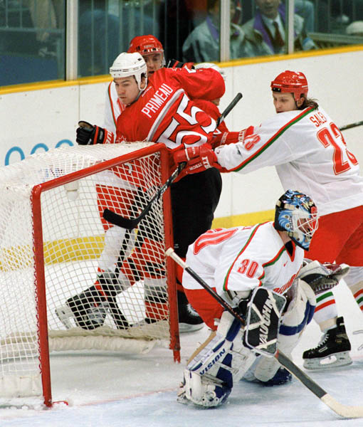 Canada's Keith Primeau (55) competes in hockey action against Belarus at the 1998 Winter Olympics in Nagano. (CP Photo/COA/ F. Scott Grant )