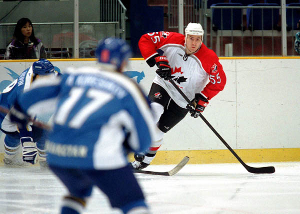 Canada's Keith Primeau (55) competes in hockey action against Kazakstan at the 1998 Winter Olympics in Nagano. (CP Photo/COA/ F. Scott Grant )