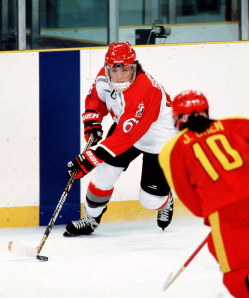 Canada's Vicky Sunohara (left) competes in women hockey action against China at the 1998 Nagano Winter Olympics. (CP PHOTO/COA/Mike Ridewood)