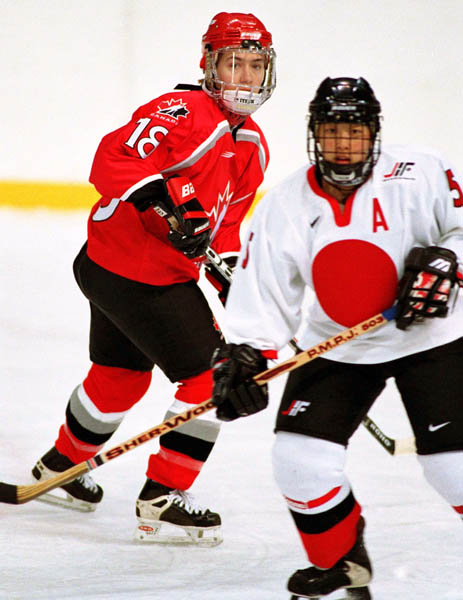 Canada's Nancy Drolet (18) competes in women hockey action against Japan at the 1998 Nagano Winter Olympics. (CP PHOTO/COA/F. Scott Grant)