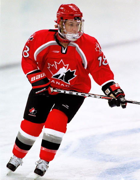 Canada's Nancy Drolet (18) competes in women hockey action at the 1998 Nagano Winter Olympics. (CP PHOTO/COA/F. Scott Grant)