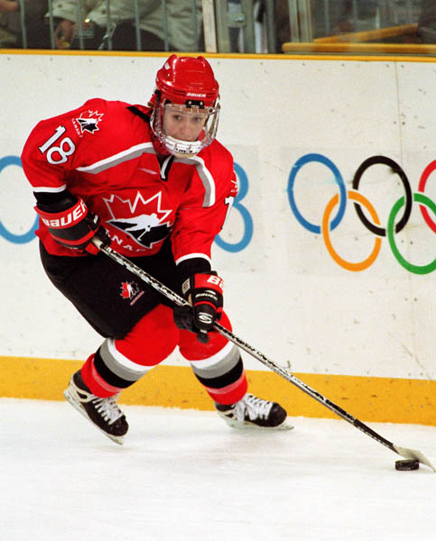 Canada's Nancy Drolet (18) competes in women hockey action at the 1998 Nagano Winter Olympics. (CP PHOTO/COA/F. Scott Grant)