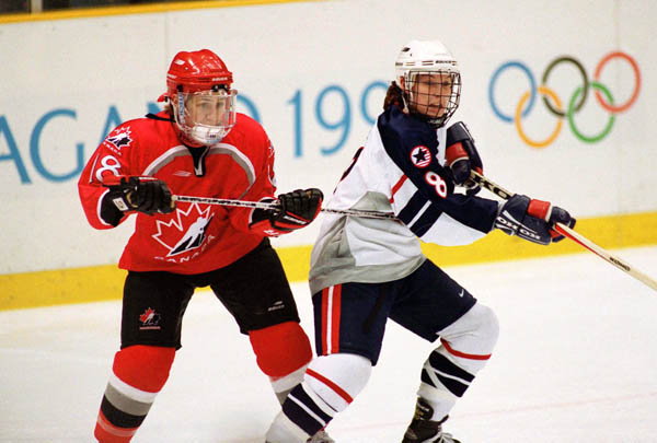 Canada's Nancy Drolet (18) competes in women hockey action against the United States at the 1998 Nagano Winter Olympics. (CP PHOTO/COA/F. Scott Grant)