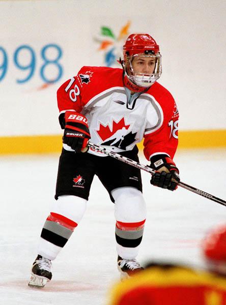Canada's Nancy Drolet (18) competes in women hockey action against China at the 1998 Nagano Winter Olympics. (CP PHOTO/COA/F. Scott Grant)