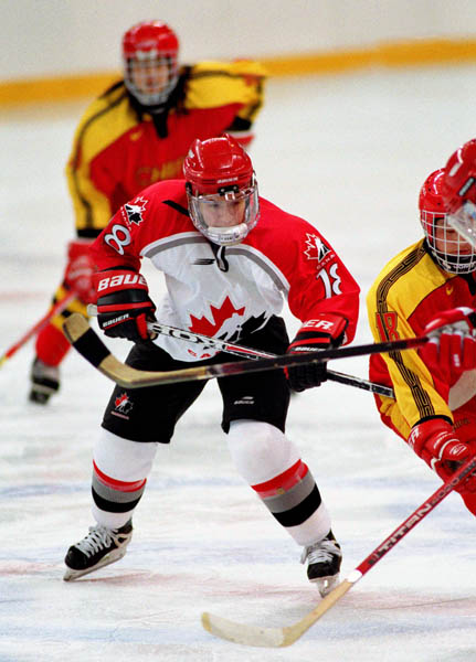 Canada's Nancy Drolet (18) competes in women hockey action against China at the 1998 Nagano Winter Olympics. (CP PHOTO/COA/F. Scott Grant)