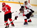 Canada's Laura Schuler (27) competes in women hockey action at the 1998 Nagano Winter Olympics. (CP PHOTO/COA/Mike Ridewood)