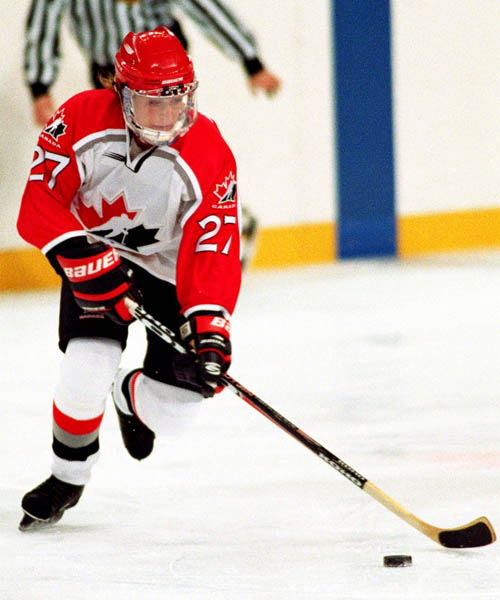 Canada's Laura Schuler (27) competes in women hockey action at the 1998 Nagano Winter Olympics. (CP PHOTO/COA/Mike Ridewood)