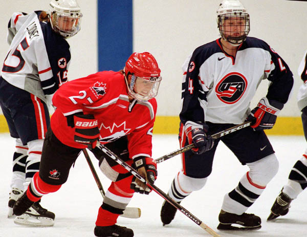 Canada's Laura Schuler (27) competes in women hockey action against the United States at the 1998 Nagano Winter Olympics. (CP PHOTO/COA/Mike Ridewood)