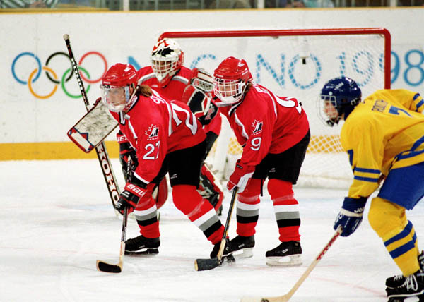 Team Canada competes in women hockey action against Sweden at the 1998 Nagano Winter Olympics. (CP PHOTO/COA/Mike Ridewood)