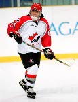 Canada's Hayley Wickenheiser (22) competes in women hockey action against Japan at the 1998 Nagano Winter Olympics. (CP PHOTO/COA/Mike Ridewood)