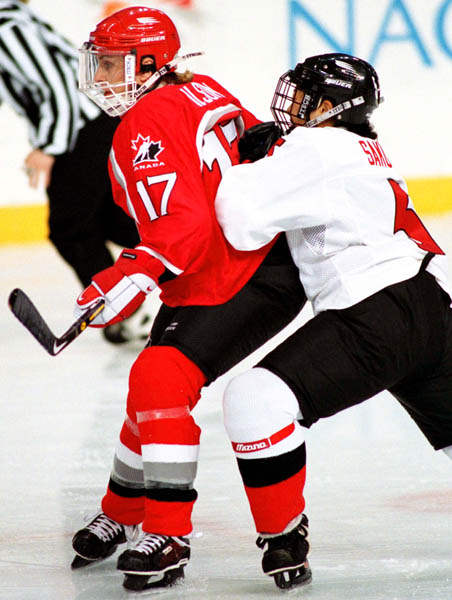 Canada's Stacy Wilson (17) competes in women hockey action against Japan at the 1998 Nagano Winter Olympics. (CP PHOTO/COA/Mike Ridewood)