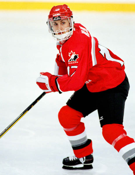 Canada's Stacy Wilson (17) competes in women hockey action at the 1998 Nagano Winter Olympics. (CP PHOTO/COA/Mike Ridewood)
