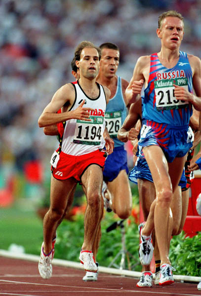 Canada's Joel Bourgeois (left) competes in the 3000m steeplechase at the 1996 Olympic games in Atlanta. (CP PHOTO/ COA/Claus Andersen)
