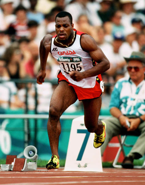 Canada's Carlton Chambers competes in the 100m during athletics competition at the 1996 Olympic games in Atlanta. (CP PHOTO/ COA/Claus Andersen)