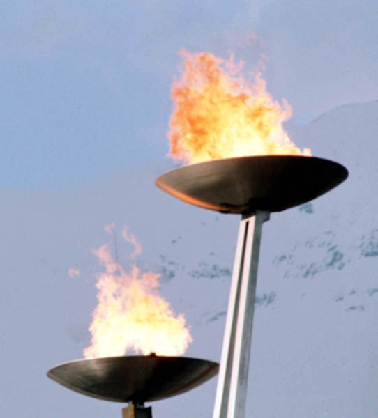 The Olympique flame is lit during opening ceremonies of the 1976 Winter Olympics in Innsbruck. (CP Photo/COA)