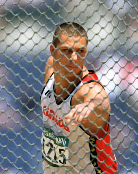 Canada's Jason Tunks competes in the discus event at the 1996 Olympic games in Atlanta. (CP PHOTO/ COA/Claus Andersen)