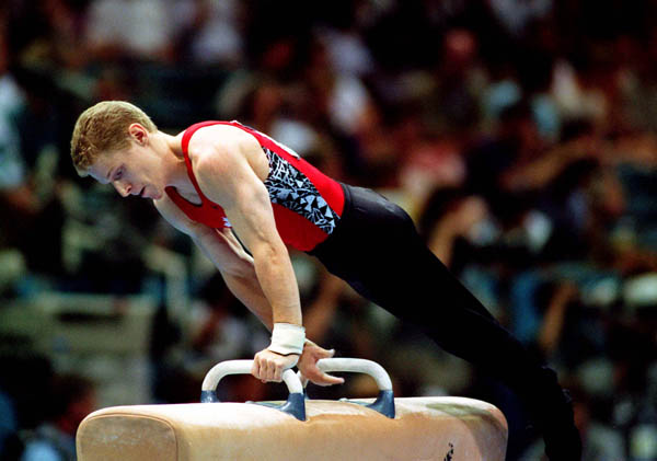 Canada's Kris Burley competes in a gymnastics event at the 1996 Atlanta Summer Olympic Games. (CP Photo/COA/Claus Andersen)