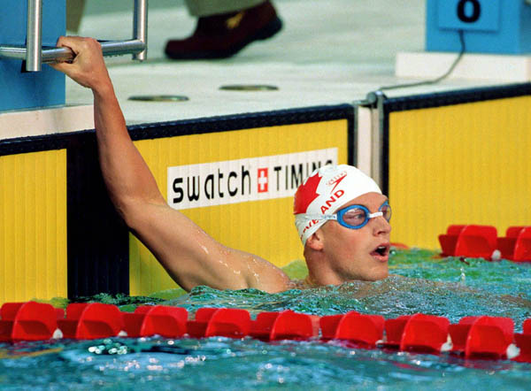 Canada's Jon Cleveland competes in a swimming event at the 1996 Atlanta Summer Olympic Games. (CP Photo/COA/Mike Ridewood)