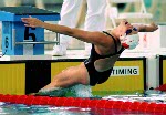 Canada's Julie Howard competes in a swimming event at the 1996 Atlanta Summer Olympic Games. (CP Photo/COA/Mike Ridewood)