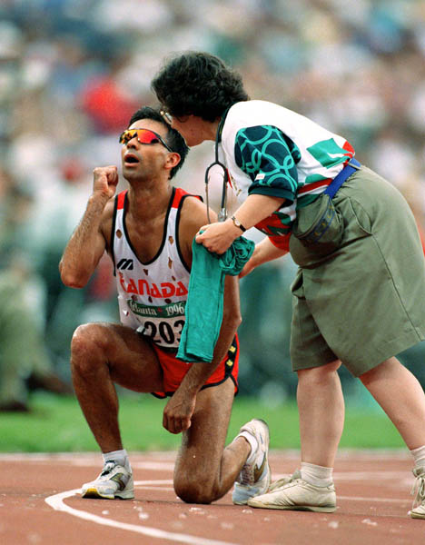 Canada's Arturo Huerta competes in an athletics event at the 1996 Olympic games in Atlanta. (CP PHOTO/ COA/Claus Andersen)