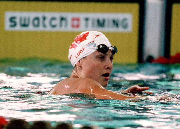 Canada's Marianne Limpert competes in a swimming event at the 1996 Atlanta Summer Olympic Games. (CP Photo/COA/Mike Ridewood)