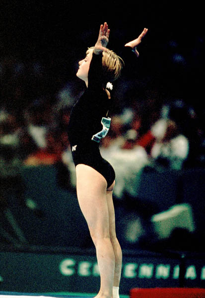 Canada's Shanyn MacEachern competes in the gymnastics event at the 1996 Atlanta Summer Olympic Games. (CP Photo/COA/Claus Andersen)