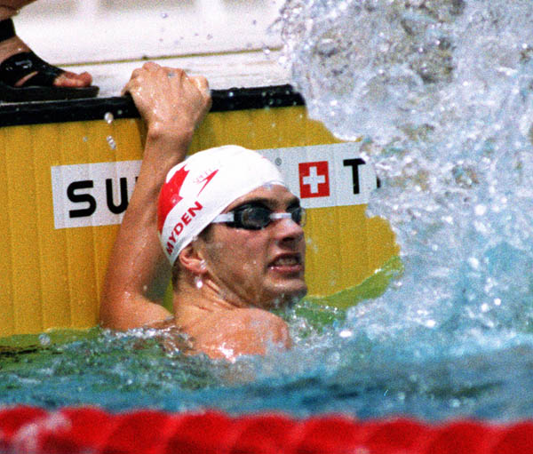 Canada's Curtis Myden celebrates his gold medal time  in a swimming event at the 1996 Atlanta Summer Olympic Games. (CP Photo/ COA/Mike Ridewood)