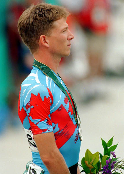 Canada's Brian Walton celebrates the silver medal he won in the men's cycling points race at the 1996 Atlanta Summer Olympic Games. (CP PHOTO/COA/Mike Ridewood)