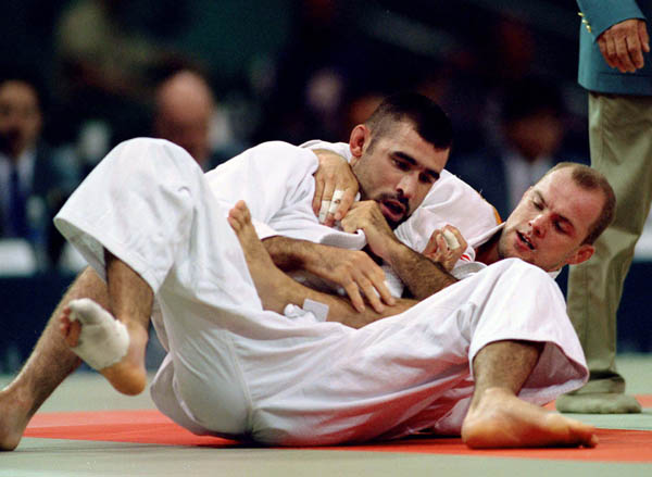 Canada's Nicolas Gill (front) competes in the judo event at the 1996 Atlanta Summer Olympic Games. (CP Photo/COA/F. Scott Grant)