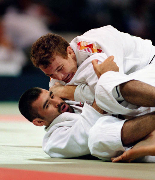 Canada's Nicolas Gill (bottom) competes in the judo event at the 1996 Atlanta Summer Olympic Games. (CP Photo/COA/F. Scott Grant)