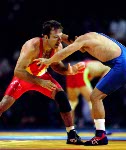 Canada's David Hohl (red) competes in the wrestling event at the 1996 Atlanta Olympic Games. (CP Photo/COA/Mike Ridewood)