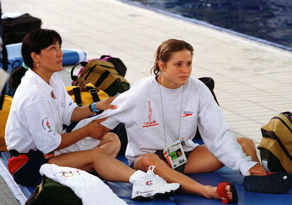 Canada's Yi Hua Li (left), coach, and Anne Montminy participate the diving event at the 1996 Atlanta Summer Olympic Games. (CP PHOTO/COA/F. Scott Grant)
