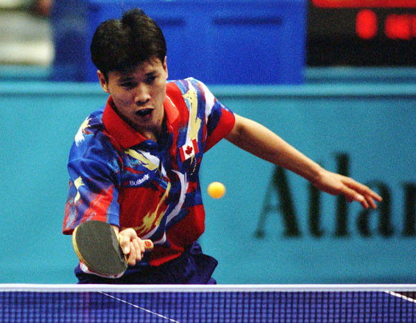 Canada's Johnny Huang competes in the table tennis event at the 1996 Atlanta Olympic Games. (CP Photo/COA/Scott Grant)