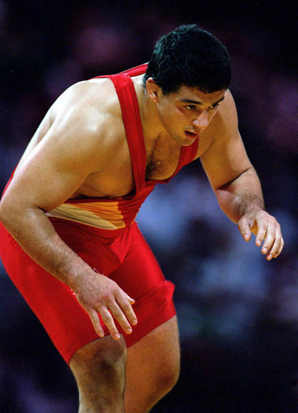 Canada's Guivi Sissaouri competes in the wrestling event at the 1996 Atlanta Olympic Games. (CP Photo/COA/Mike Ridewood)