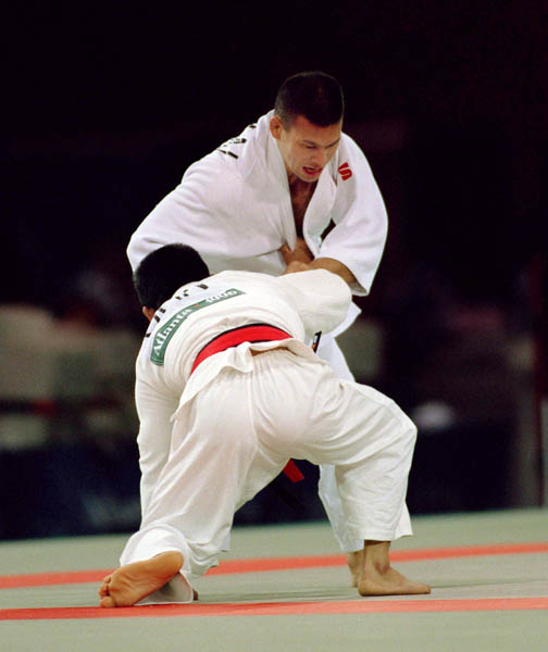 Canada's Taro Tan (behind) competes in the judo event at the 1996 Atlanta Summer Olympic Games. (CP Photo/COA/F. Scott Grant)