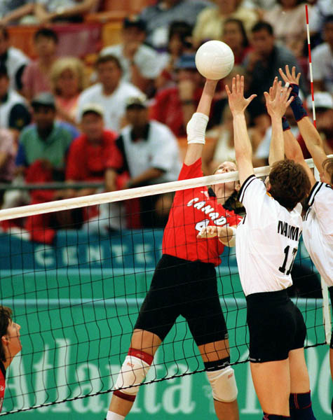 Canada's Katrina Von Sass (4) participates in volleyball action at the 1996 Atlanta Olympic Games. (CP Photo/COA/F. Scott Grant)